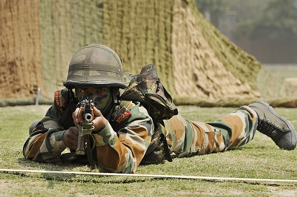Indian Army soldier at a mock drill (Burhaan Kinu/Hindustan Times via Getty Images)