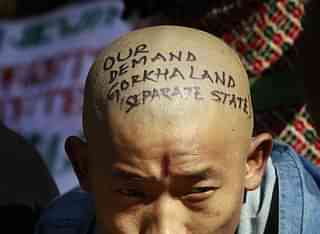 A Gorkha activist takes
part in a demonstration demanding a separate Gorkhaland state in the Darjeeling.
(Vipin Kumar/Hindustan Times via GettyImages)<b></b>