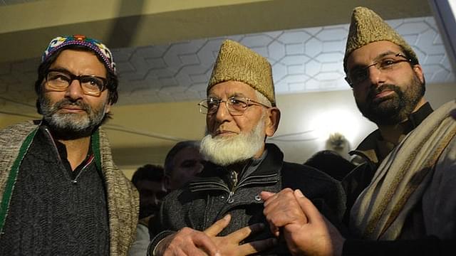 Kashmiri separatist leaders Yasin Malik (left), Geelani (centre), Umar Farooq during a press conference in Srinagar. (TAUSEEF MUSTAFA/AFP/Getty Images)
