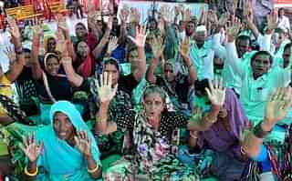 Pilgrims shouting religious slogans at yatri base camp in Jammu. (Nitin Kanotra/Hindustan Times via Getty Images)