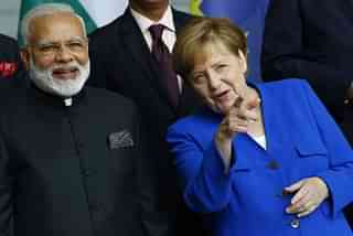 Narendra Modi and Angela Merkel (Michele Tantussi/Getty Images)