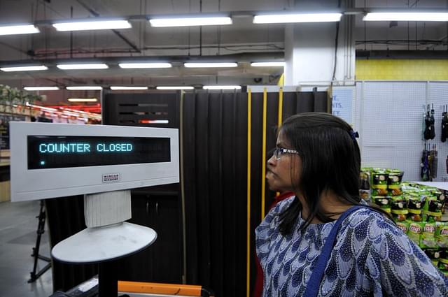 ‘Counter closed’ sign is displayed at a supermarket after huge rush was seen hours before the introduction of good and services tax on 1 July. (Sunil Ghosh/Hindustan Times via GettyImages)