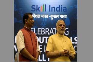 Prime Minister Narendra Modi (R) with Minister of State Skill Development & Entrepreneurship (Independent Charge) Rajiv Pratap Rudy during the launch of the ‘Skill India’ initiative in New Delhi on 15 July 2015. (PRAKASH SINGH/AFP/Getty Images)