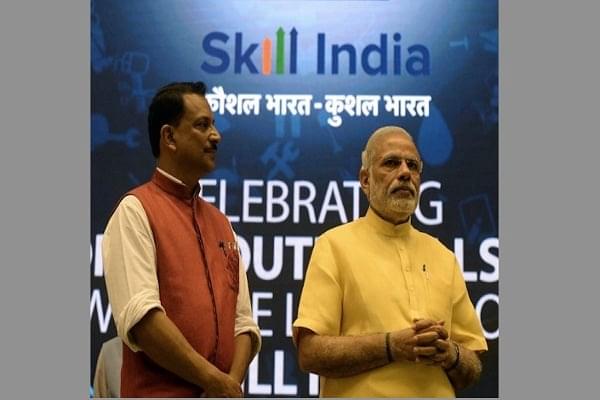 Prime Minister Narendra Modi (R) with Minister of State Skill Development & Entrepreneurship (Independent Charge) Rajiv Pratap Rudy during the launch of the ‘Skill India’ initiative in New Delhi on 15 July 2015. (PRAKASH SINGH/AFP/Getty Images)