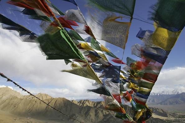 Tibetan prayer flags fly over the city of Leh at 12,000ft above sea level  in Ladakh, India. (Paula Bronstein/Getty Images)