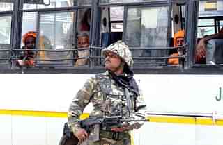 A soldier stands guard. (Nitin Kanotra/Hindustan Times via GettyImages) 