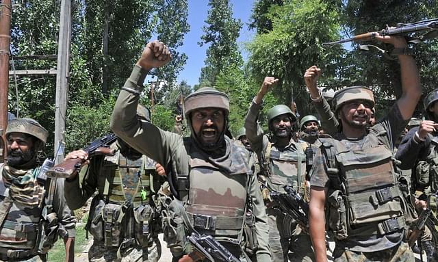Indian armed forces celebrate after a successful operation against terrorists. (Waseem Andrabi/ Hindustan Times via GettyImages)