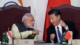 Indian Prime Minister Narendra Modi, left, talks with Chinese President Xi Jinping at the