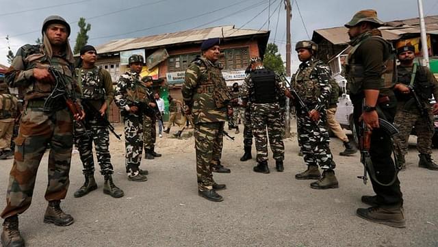 Paramilitary forces guard the site where Amarnath pilgrims were attacked.&nbsp;