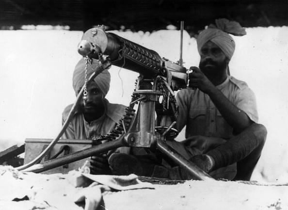 Two Indian gunners, contributing their services to the Allied Army, at their machine gun in the Libyan desert. (Keystone/Getty Images)
