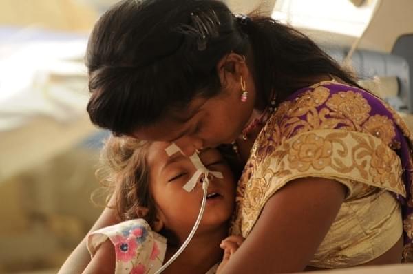 A child admitted inside the encephalitis ward at BRD Medical Centre, Gorakhpur, on 15 August 2017. (Deepak Gupta/Hindustan Times via Getty Images)