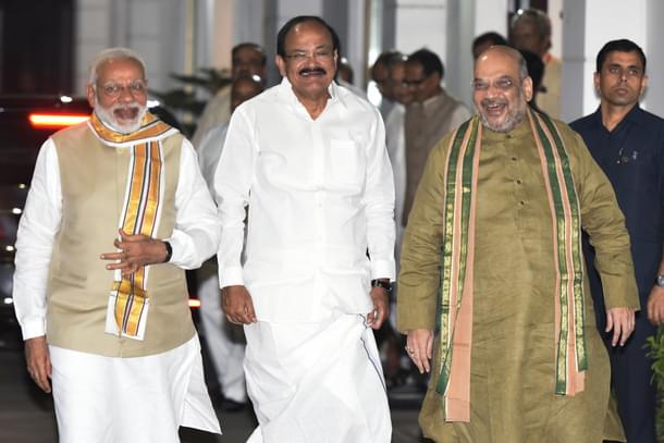 Venkaiah Naidu with BJP President Amit Shah and Prime Minister Narendra Modi at BJP Headquarters (Vipin Kumar/Hindustan Times via Getty Images)