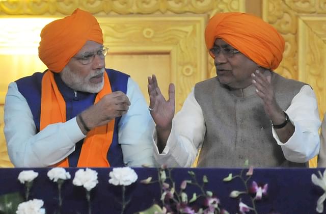 

PM Modi and CM of Bihar Nitish Kumar during the 350th birth anniversary of Guru Gobind Singh, on January 5, 2017 in Patna. (AP Dube/Hindustan Times)