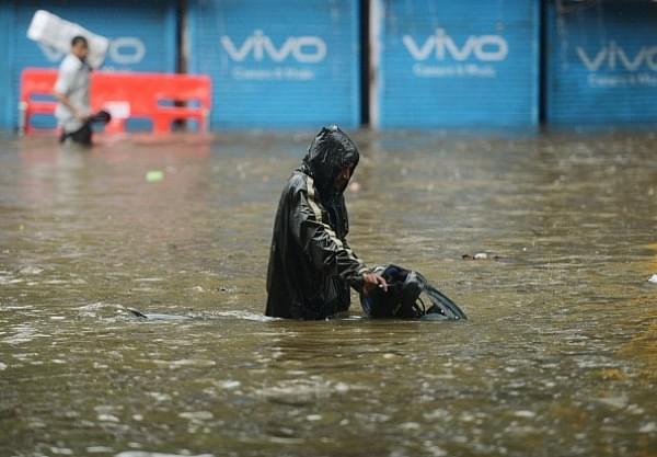 Heavy rain brought India’s financial capital Mumbai to a virtual standstill on 29 August. (PUNIT PARANJPE/AFP/Getty Images)