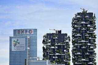 A picture shows the Lombardia Region building advertizing EXPO2015 (R) and a part of the Bosco Verticale towers (Vertical Forest) in the Porta Nuova area on April 28, 2015. (OLIVIER MORIN/AFP/Getty Images)
