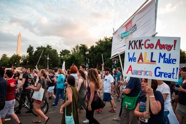 Demonstrators march on 13 August 2017 in Washington, DC, to a statue of Confederate General Albert Pike. (ZACH GIBSON/AFP/Getty Images)