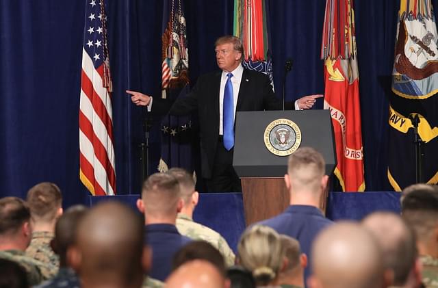 US President Donald Trump gestures before delivering remarks on America’s military involvement in Afghanistan at the Fort Myer military base on 21 August  2017 in Arlington, Virginia. (Mark Wilson/GettyImages)