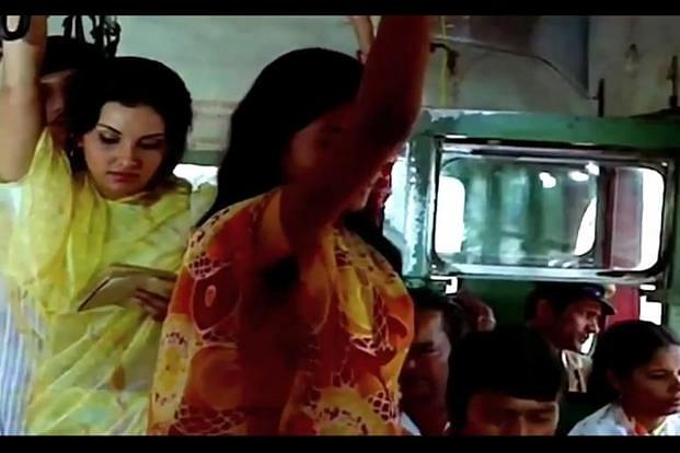 Vidya Sinha riding a bus in a still from ‘Choti Si Baat’. &nbsp;