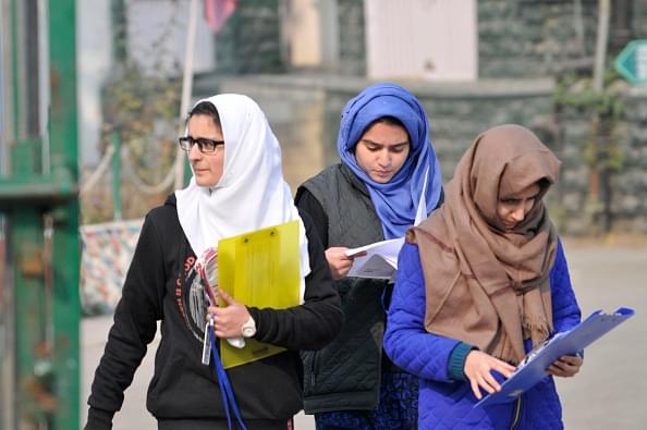 Kashmiri students leave an examination centre in Srinagar. (Waseem Andrabi/Hindustan Times via GettyImages) 