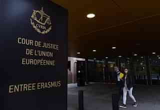 People walk away from the entrance of the European Court of Justice in Luxembourg. (JOHN THYS/AFP/Getty Images)