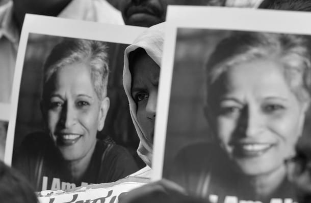 People stage a protest against the killing of senior journalist Gauri Lankesh, at Town Hall on September 6, 2017 in Bengaluru, India. (Arijit Sen/Hindustan Times via Getty Images)