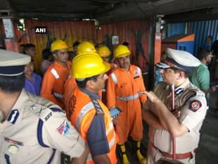 NDRF team and police at the site of the stampede. (ANI)