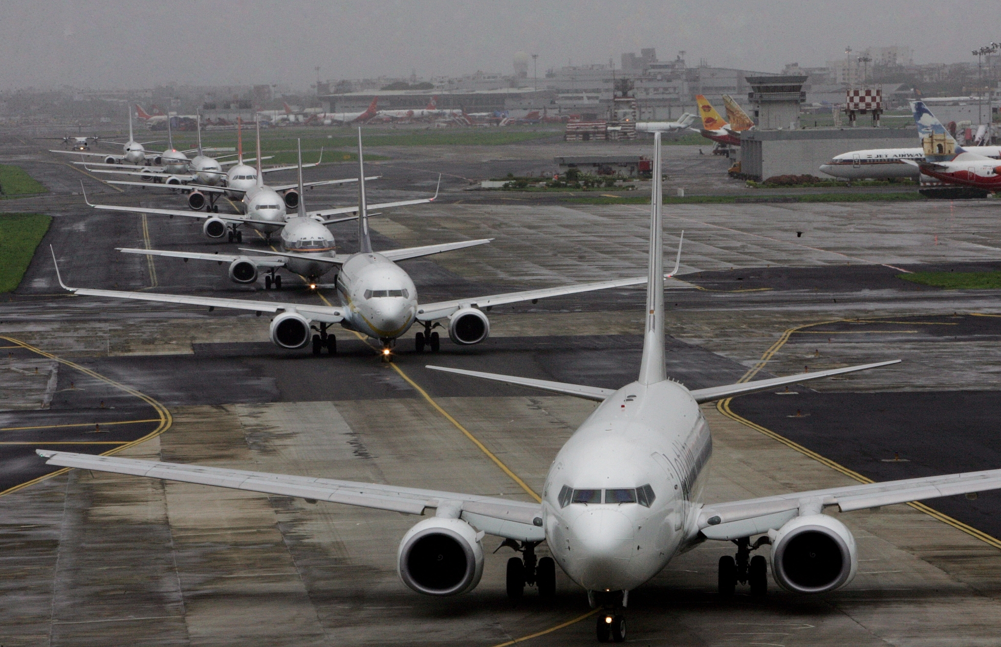 Planes lined up for take-off at Mumbai Airport (Vijayananda Gupta/Hindustan Times via Getty Images)