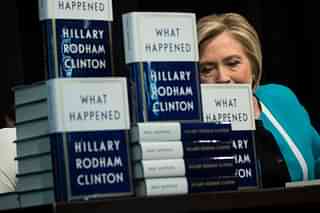Former U.S. Secretary of State Hillary Clinton signs copies of her new book ‘What Happened’ during a book signing event at Barnes and Noble bookstore September 12, 2017 in New York City. Clinton’s book, which focuses on her 2016 election loss to President Donald Trump, goes on sale today. (Drew Angerer/Getty Images)