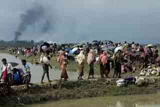 Rohingya Refugees in Ukhia along the Myanmar-Bangladesh border (K.M. ASAD/AFP/Getty Images)
