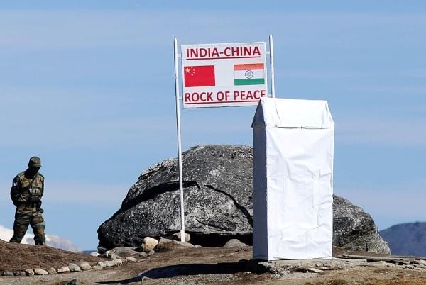 An Indian Army soldier keeps a vigil at Bumla pass at the India-China border. (BIJU BORO/AFP/Getty Images)