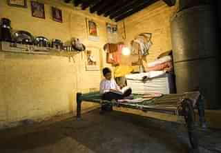 A house in rural India gets electricity for the first time. (Priyanka Parashar/Mint via Getty Images)