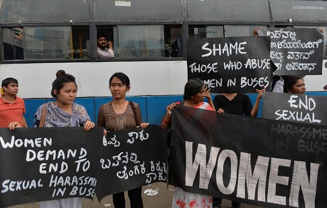 Women protesting against harassment in buses (Manjunath Kiran/AFP/Getty Images)