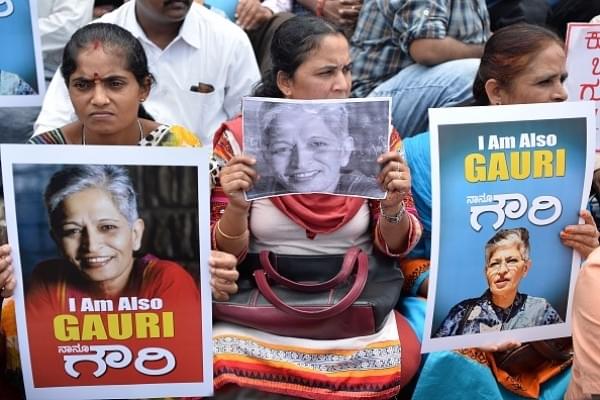 Indian protesters take part in a rally condemning the killing of journalist Gauri Lankesh in Bengaluru on 6 September  2017. (MANJUNATH KIRAN/AFP/Getty Images)