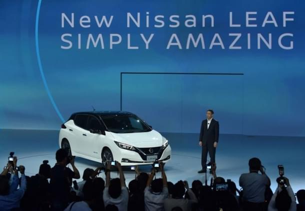 Nissan’s chief executive Hiroto Saikawa
stands next to the new Nissan LEAF. (Kazuhiro Nogi/AFP/Getty Images