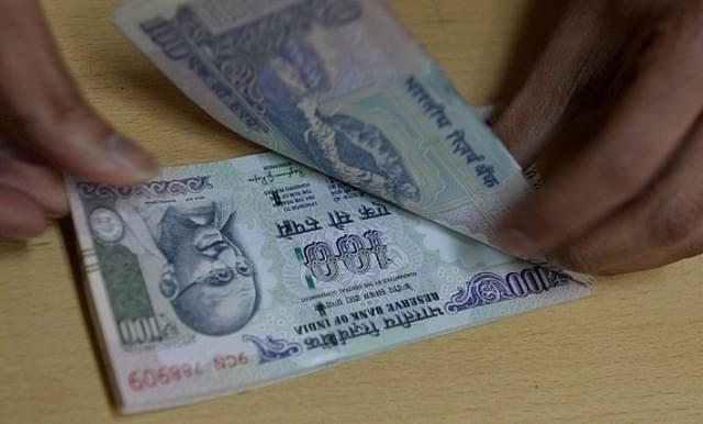  Indian 100-rupee notes (INDRANIL MUKHERJEE/AFP/Getty Images)