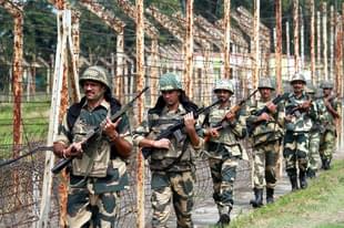Border Security Force soldiers keep vigil as they patrol at International Border (Octroi Post) about 35 km from Jammu  (Nitin Kanotra/Hindustan Times via Getty Images