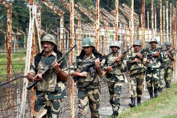 Border Security Force soldiers keep vigil as they patrol at International Border (Octroi Post) about 35 km from Jammu  (Nitin Kanotra/Hindustan Times via Getty Images