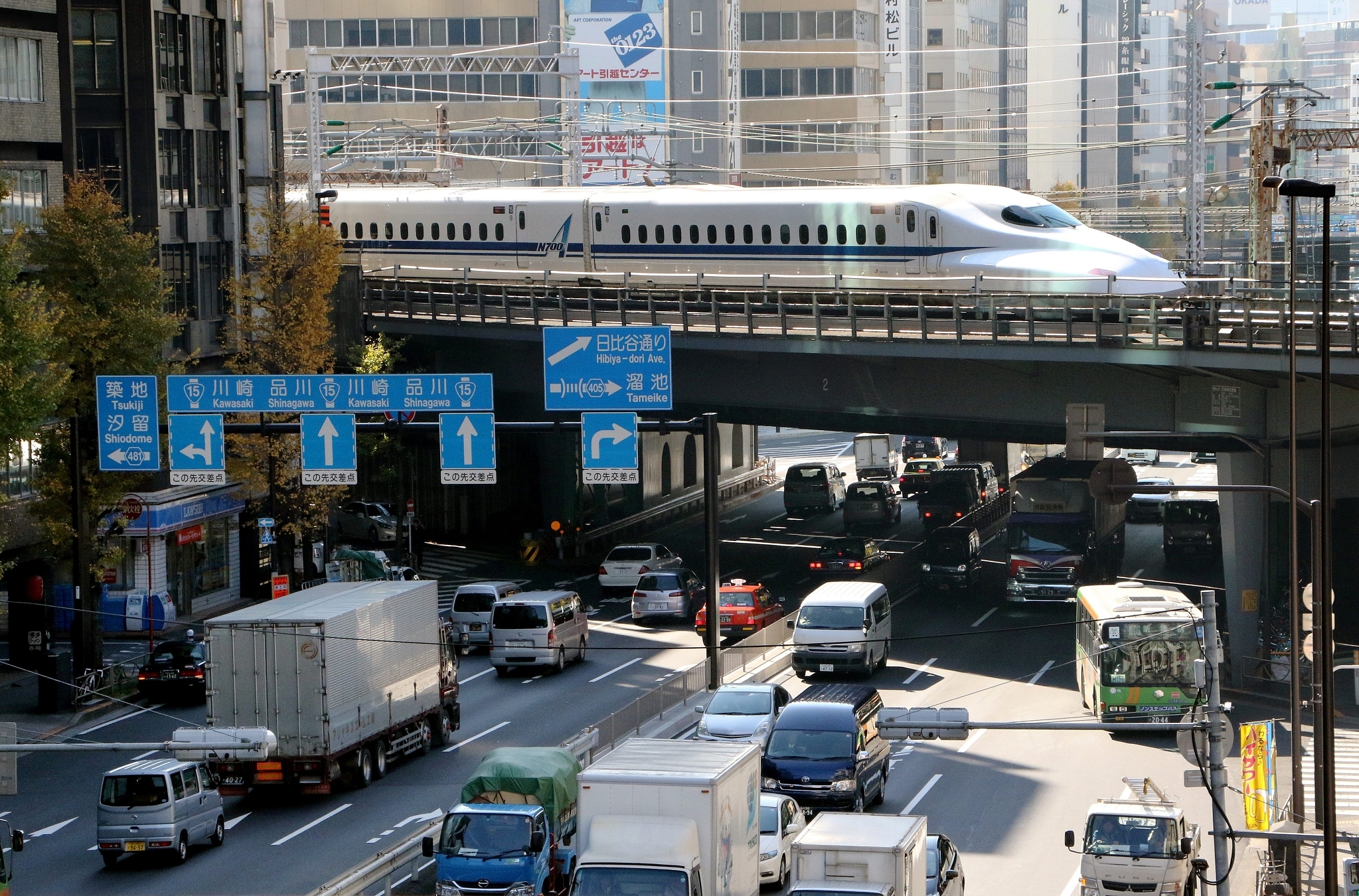A Shinkansen train over a road in Tokyo (YOSHIKAZU TSUNO/AFP/GettyImages)
