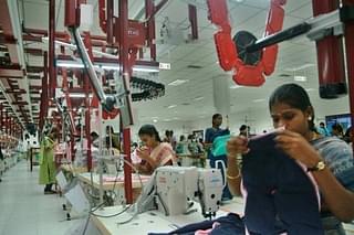 Workers at a garments factory. (Getty Images)