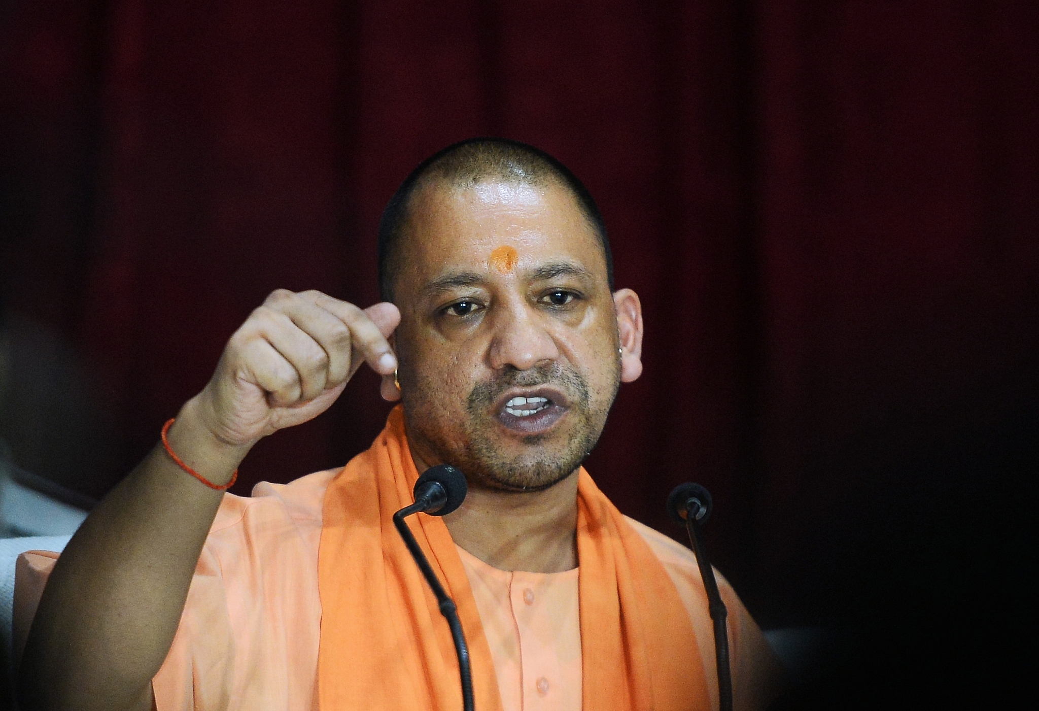 Chief Minister of Uttar Pradesh (UP), Yogi Adityanath gestures during a press confrence after visiting the Baba Raghav Das Hospital in Gorakhpur. (SANJAY KANOJIA/AFP/Getty Images)