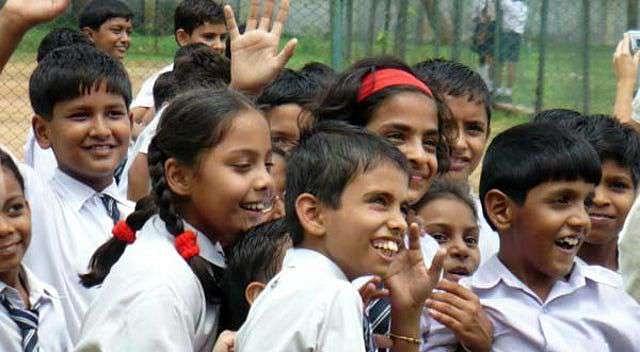 Children gather at their school grounds.