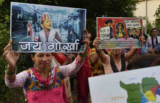 Supporters of Gorkhaland Movement chant slogans during the 38th day of an indefinite strike at Milanmore village in Darjeeling district on the outskirts of Siligur (DIPTENDU DUTTA/AFP/Getty Images)