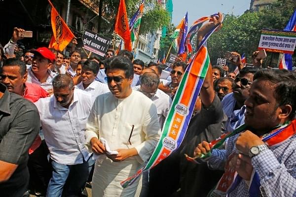 MNS chief Raj Thackeray and party activists participate in a protest rally.