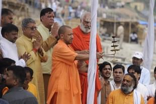 Uttar Pradesh Chief Minister Yogi Adityanath doing arti at Sarayu River ghat in Ayodhya. (Deepak Gupta/Hindustan Times via Getty Images)