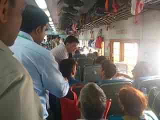 Goyal interacting with passengers.