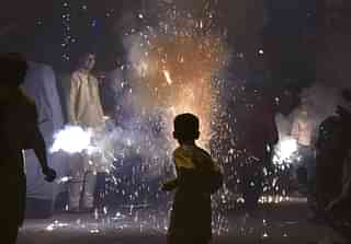 Children playing with fireworks in Delhi (Sonu Mehta/Hindustan Times via Getty Images)
