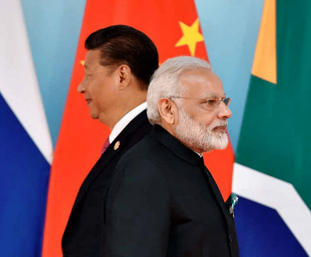 Xi Jinping and Narendra Modi attend the group photo session during the BRICS Summit at the Xiamen. (KENZABURO FUKUHARA/AFP/Getty Images)