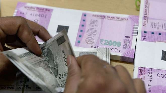 

Indian currency notes. (INDRANIL MUKHERJEE/AFP/GettyImages)