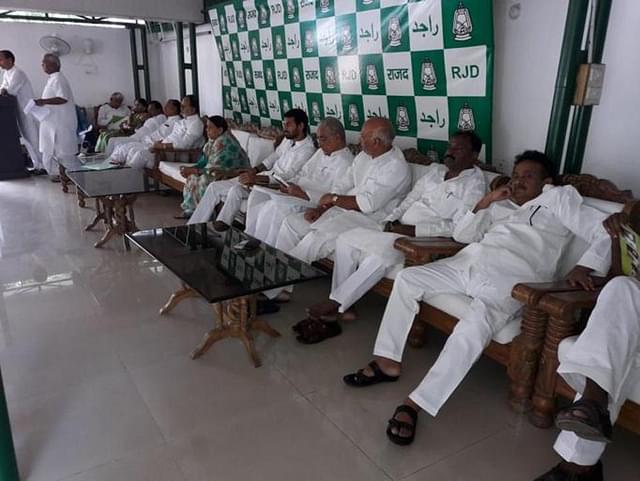 Former chief minister Rabri Devi, centre, at an RJD meeting in Patna on Wednesday. (Santosh/HT photo)<a href="javascript:void(0)"></a>