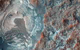 
Circular depression on the surface of Mars. (NASA)

